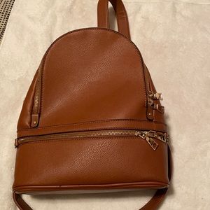 Brown leather back pack